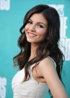 Victoria Justice Looking cute in yellow skirt at MTV Movie Awards in Universal Studios